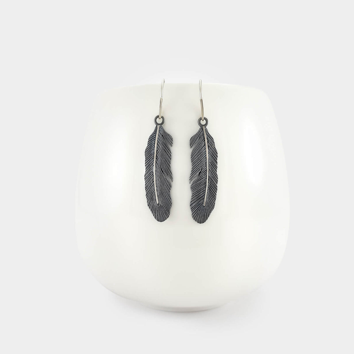 Dramatic Statement Silver Colored Large Feather Earrings With